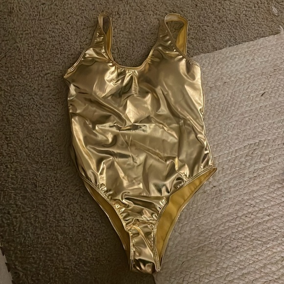 Gold one piece suit. - Picture 5 of 6